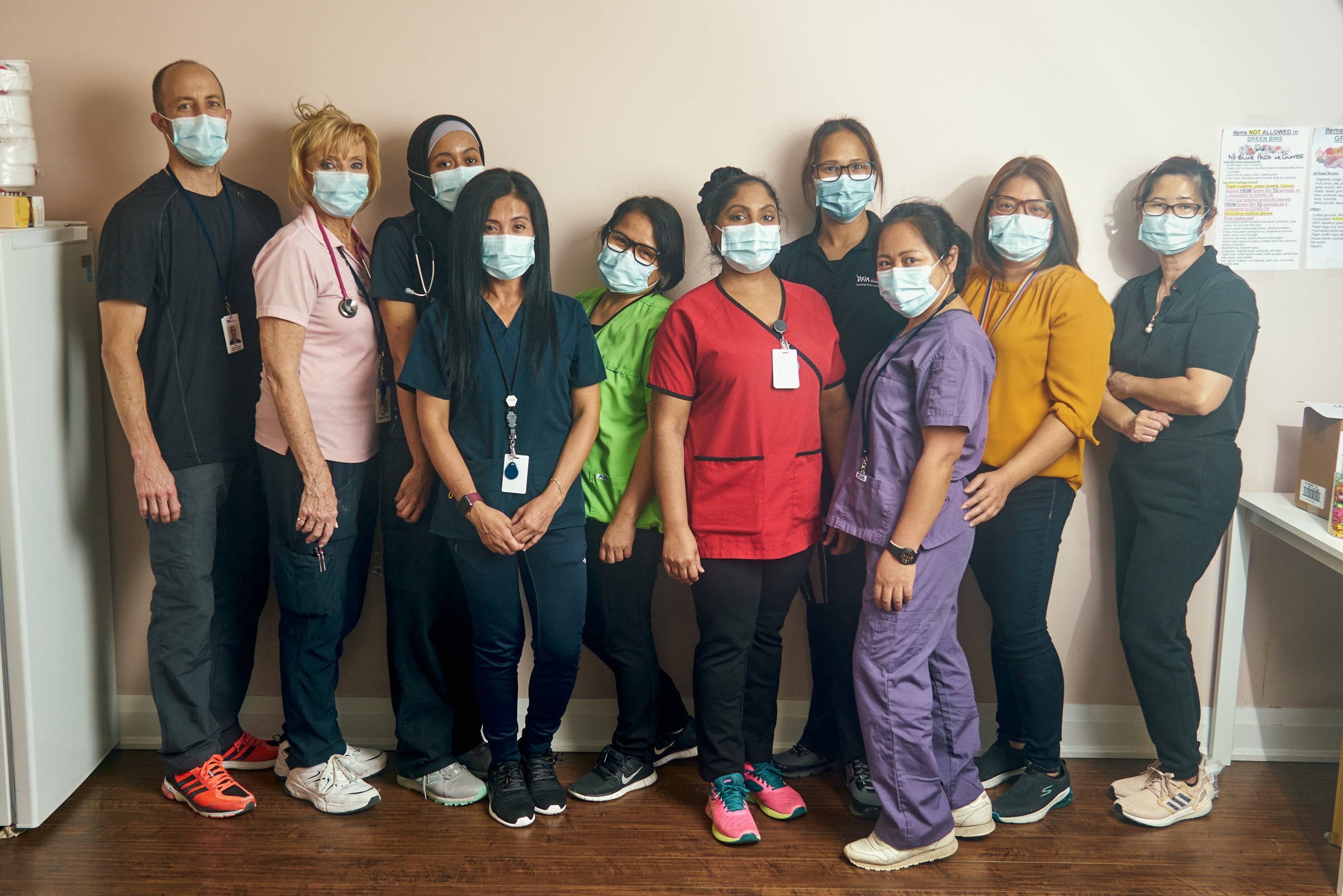 A group of nurses wearing masks