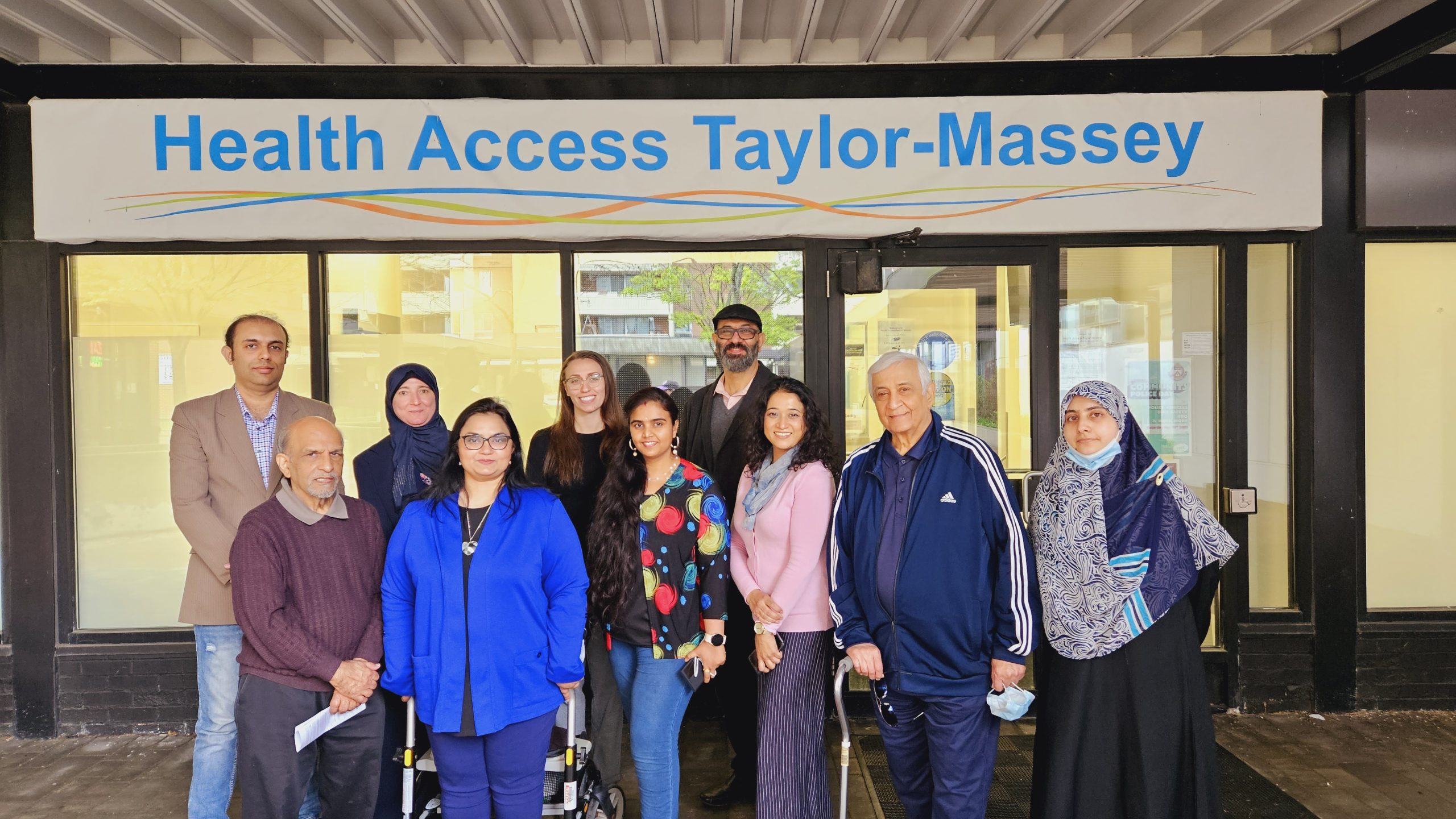 Ten Taylor-Massey Residents Wellness Council members standing outside of Health Access Taylor-Massey smiling.